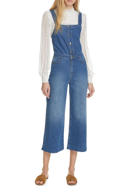 Shop Frame Claire Crop Denim Jumpsuit In La Savina