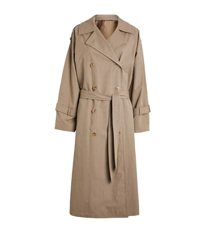 Shop Totême Techno Trench Coat