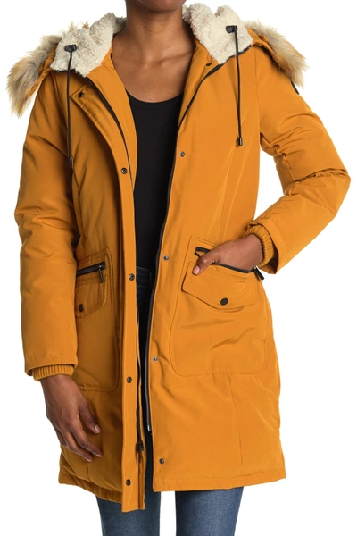 Shop French Connection Faux Fur Trim Hooded Flap Pocket Down Jacket In Dijon Yell