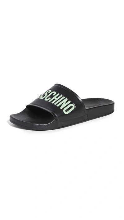 Shop Moschino Logo Slides In Black