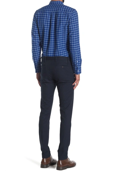 Shop Nn07 Theo Tapered Chino Pants In 200 Navy Blue L34