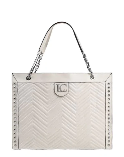 Shop La Carrie Handbags In Ivory