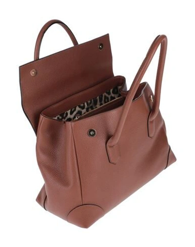 Shop Roberto Cavalli Handbags In Brown