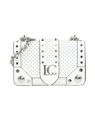 Shop La Carrie Handbags In White