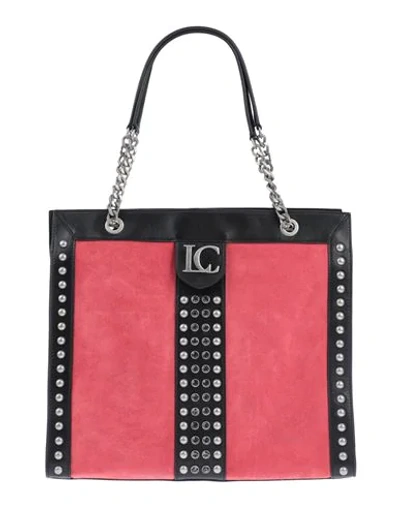 Shop La Carrie Handbags In Coral