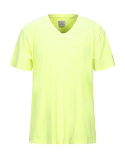 Shop Guess T-shirts In Yellow