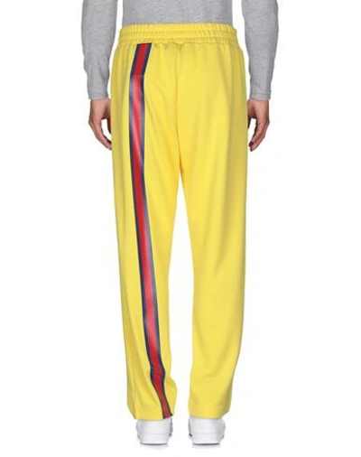 Shop Palm Angels Man Pants Yellow Size S Polyester