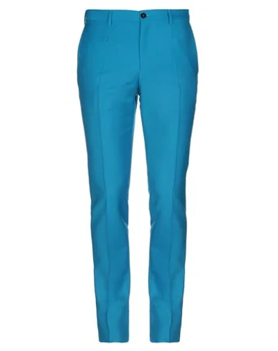 Shop Versace Pants In Turquoise