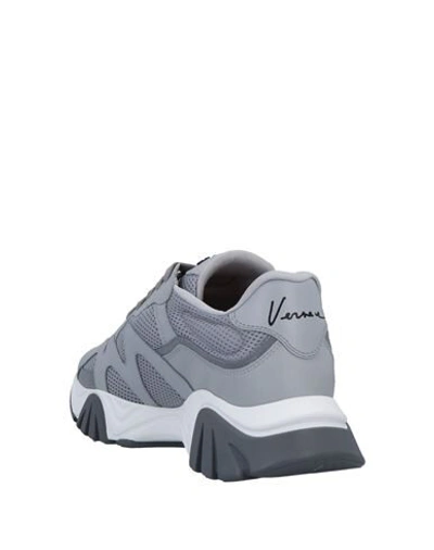 Shop Versace Sneakers In Grey