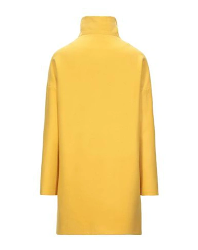 Shop Guttha Overcoats In Yellow