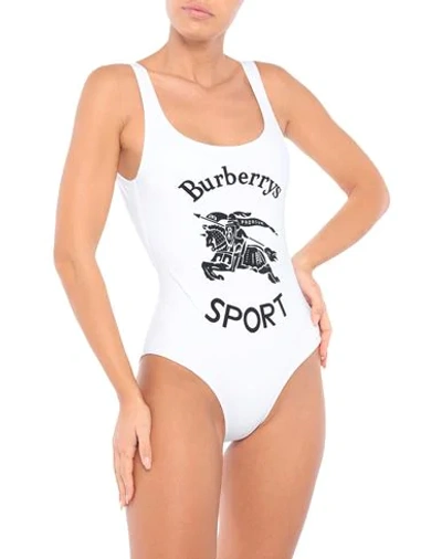 Shop Burberry One-piece Swimsuits In White