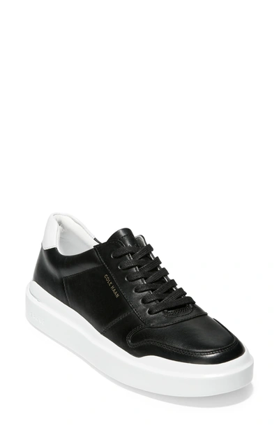 Shop Cole Haan Grandpro Rally Sneaker In Black/ White Leather
