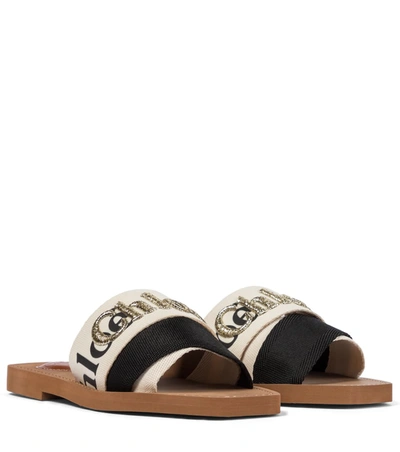 Shop Chloé Woody Embroidered Canvas Slides In White