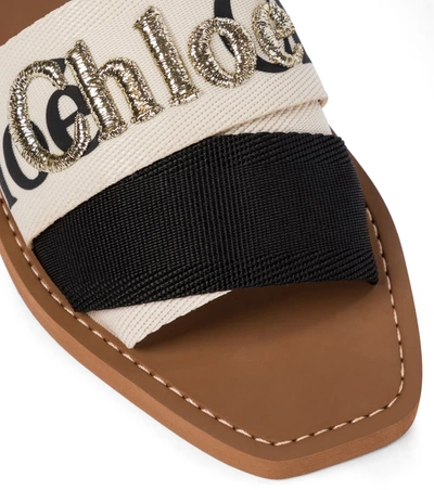 Shop Chloé Woody Embroidered Canvas Slides In White