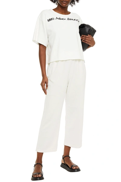 Shop Mm6 Maison Margiela Cropped French Cotton-blend Terry Track Pants In Ivory