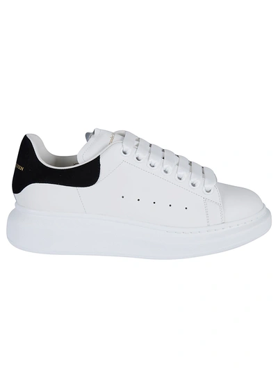 Shop Alexander Mcqueen Round Toe Classic Lace-up Sneakers In White/black