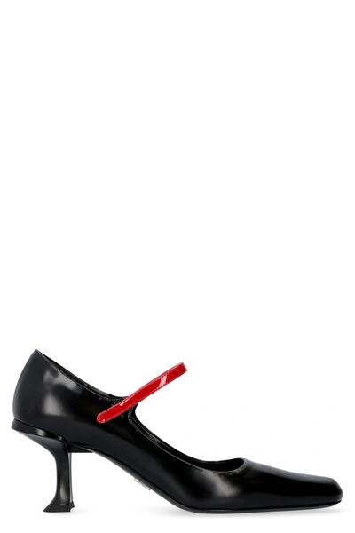 Shop Prada Leather Pumps In Black