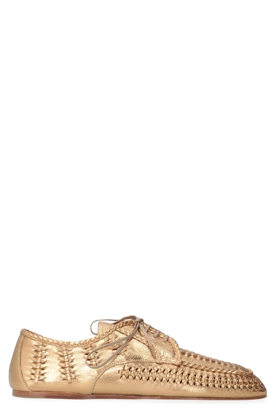 Shop Prada Metallic Leather Lace-up Shoes In Gold