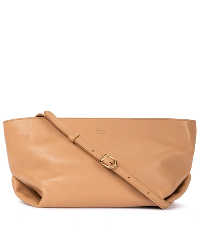 Shop Khaite Adeline Leather Crossbody Bag In Brown