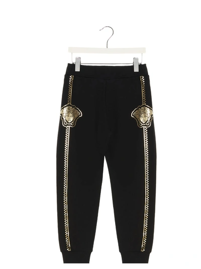 Shop Versace Sweatpants In Nero