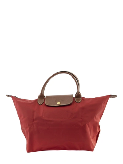 Shop Longchamp Le Pliage - Top Handle M In Red