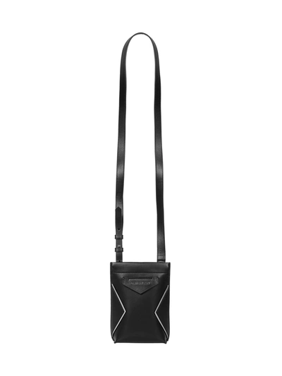 Shop Givenchy Antigona Soft Pochette In Black