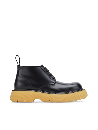 Shop Bottega Veneta The Bounce Leather Boot In Black Natural Rubber