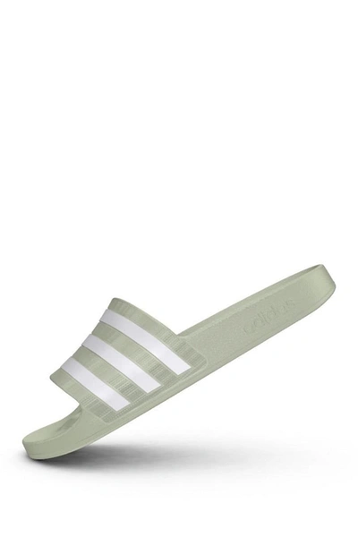Shop Adidas Originals Adilette Aqua Slide Sandal In Halgrn/ftw