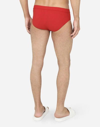 Shop Dolce & Gabbana Swim Briefs With High-cut Leg And Branded Plate In Red