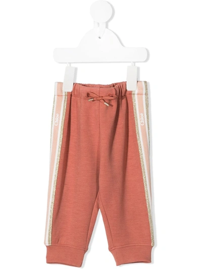 Shop Chloé Glitter Logo Stripe Trousers In Pink