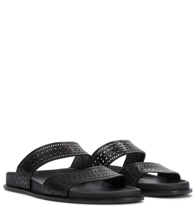 Shop Alaïa Perforated Leather Sandals In Black