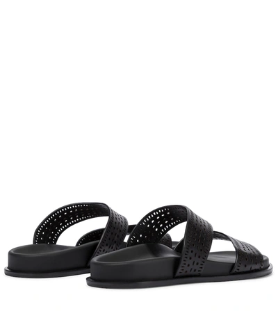 Shop Alaïa Perforated Leather Sandals In Black