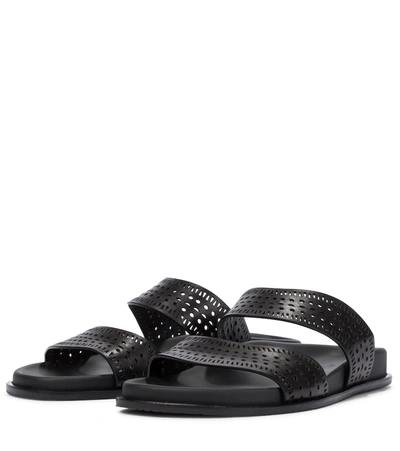 Shop Alaïa Perforated Leather Sandals In Black