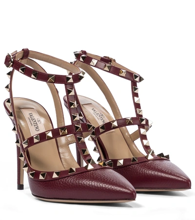 Shop Valentino Rockstud Leather Pumps In Red