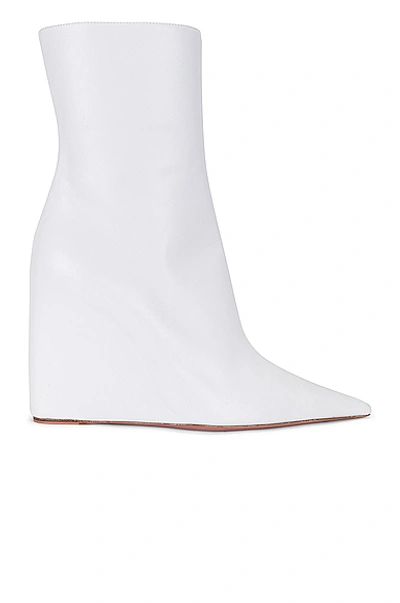 Shop Amina Muaddi Pernille Wedge Nappa Bootie In White