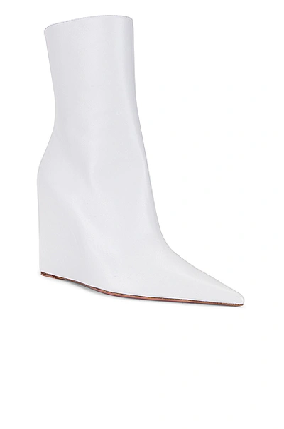 Shop Amina Muaddi Pernille Wedge Nappa Bootie In White