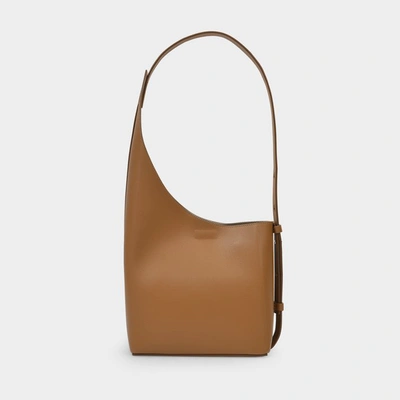 Shop Aesther Ekme Demi Lune Bag In Brown