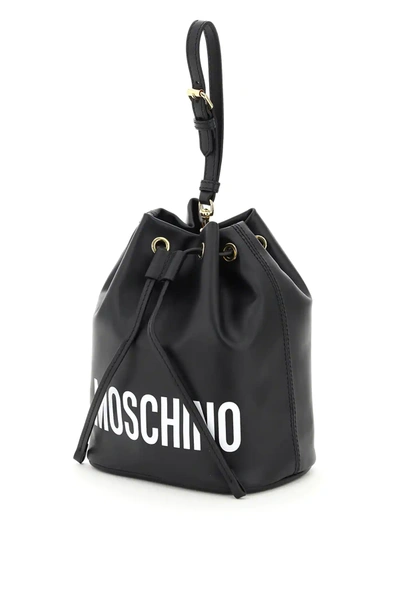 Shop Moschino Logo Bucket Bag In Black,white
