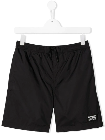 Shop Burberry Logo Patch Swim Shorts In Schwarz