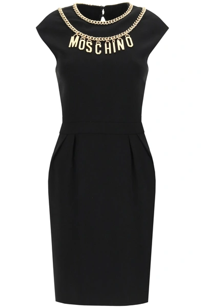 Shop Moschino Short Dress With Logo Lettering And Charm In Nero (black)