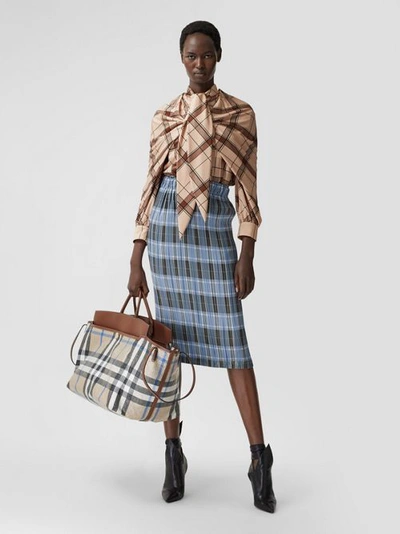 Shop Burberry Woven Check And Leather Society Holdall In Dusty Sand