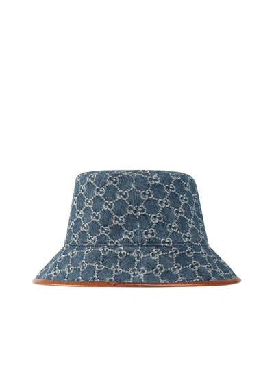 Shop Gucci Gg Supreme Leather-trimmed Bucket Hat In Brown