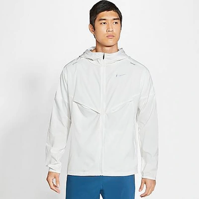 Shop Nike Men's Packable Windrunner Jacket In White