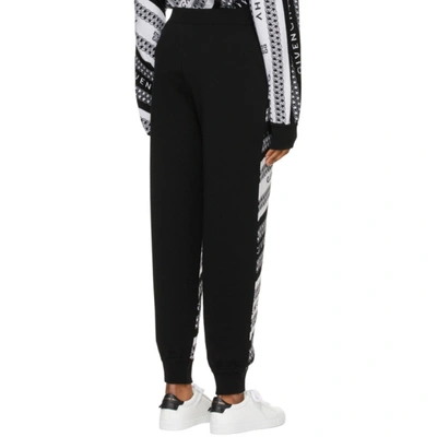 Shop Givenchy Black & White Wool Cropped Logo Lounge Pants In 004-black/