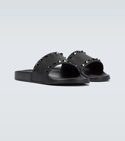Shop Valentino Rockstud Slides In Black
