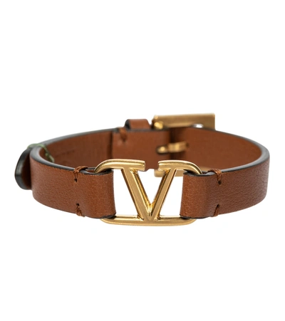 Shop Valentino Vlogo Leather Bracelet In Brown