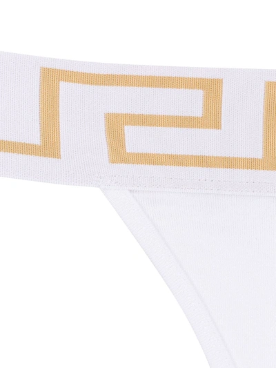 Shop Versace Greca Border Thong In White