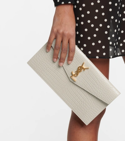 Shop Saint Laurent Uptown Croc-effect Leather Clutch In White