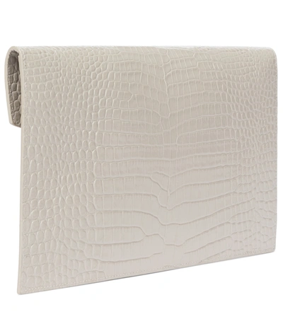 Shop Saint Laurent Uptown Croc-effect Leather Clutch In White