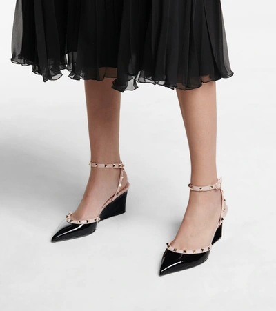 Shop Valentino Rockstud Patent Leather Wedges In Black